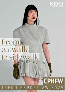four diverse woman with different hair colors and lenghts, which stand side by side and close to each other looking into the camera while standing in front of a clean grey background
